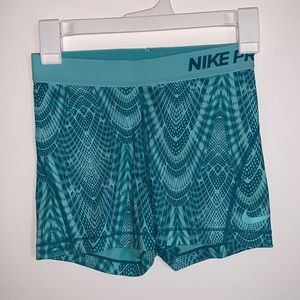 Worn twice Nike Pros! Dry fit, size small.